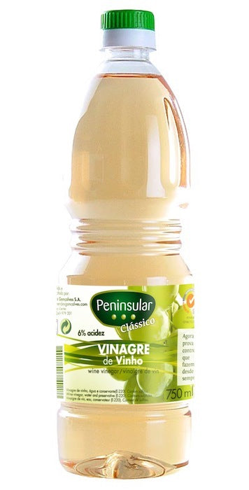 A bottle of white wine vinegar labeled 'Peninsula' with a green cap, containing 500ml of product.