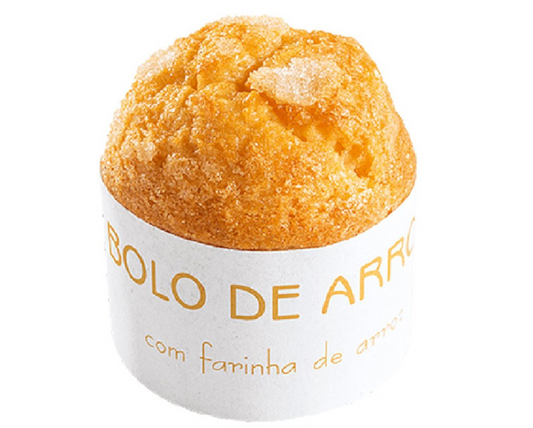 Rice Cake(Bolo de arroz) - L&B A beloved Portuguese rice muffin known for its light, fluffy texture and irresistible aroma. Made with a blend of rice flour,this golden cake is perfectly moist inside with a slightly crisp top and iconic paper wrap. Pastry 1.0 Rice Cake(Bolo de arroz)   #